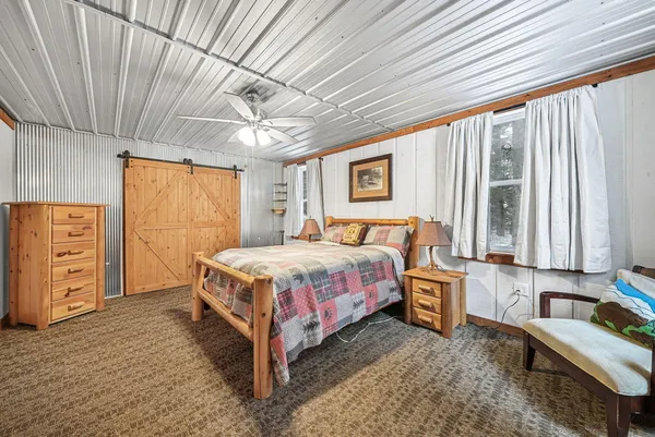 $330,000 | 8074 Grosbeak Drive Northwest, Alden, MI 49612