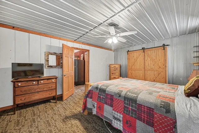 $330,000 | 8074 Grosbeak Drive Northwest, Alden, MI 49612