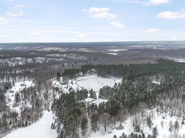 $330,000 | 8074 Grosbeak Drive Northwest, Alden, MI 49612