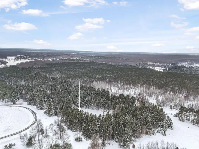 $330,000 | 8074 Grosbeak Drive Northwest, Alden, MI 49612