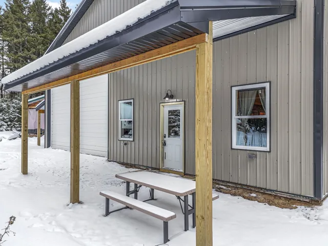 $330,000 | 8074 Grosbeak Drive Northwest, Alden, MI 49612