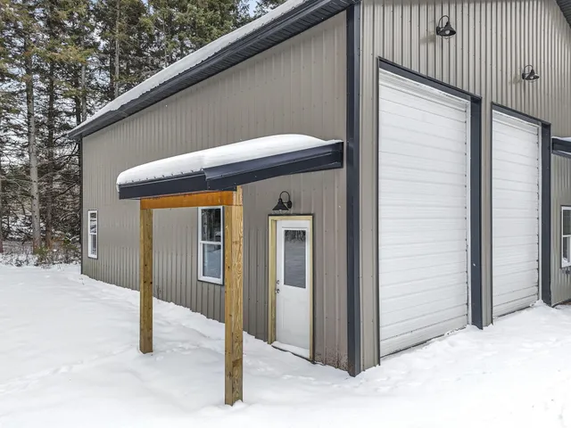 $330,000 | 8074 Grosbeak Drive Northwest, Alden, MI 49612