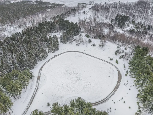 $330,000 | 8074 Grosbeak Drive Northwest, Alden, MI 49612