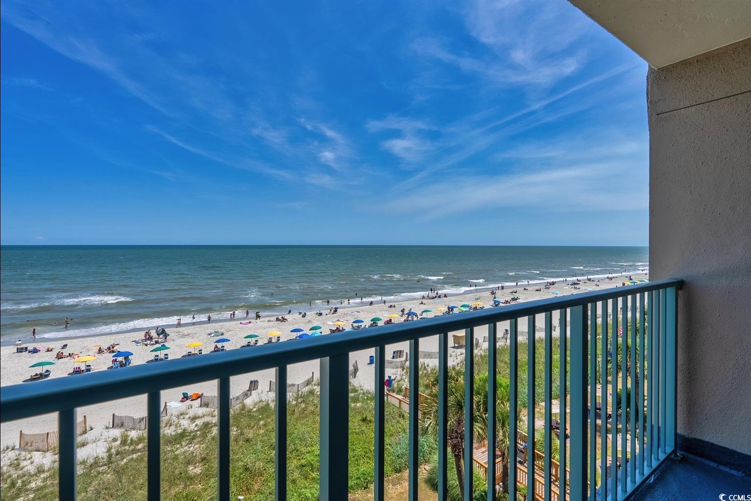 201 74th Avenue North, Unit 2527 Myrtle Beach, SC 29572 - Photo 15 of 18 Balcony with view of water and beach