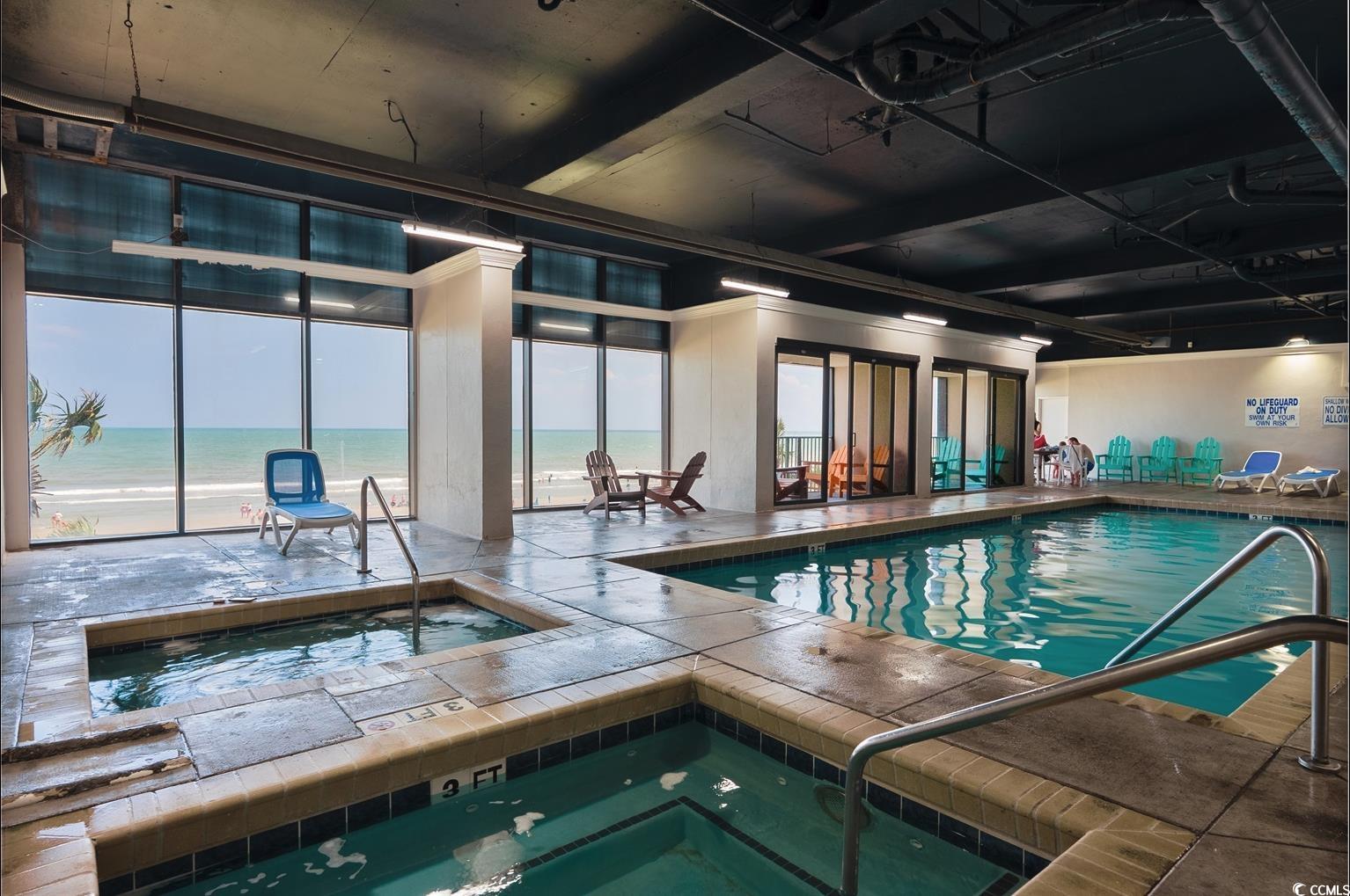 201 74th Avenue North, Unit 2527 Myrtle Beach, SC 29572 - Photo 16 of 18 Indoor pool with a water view