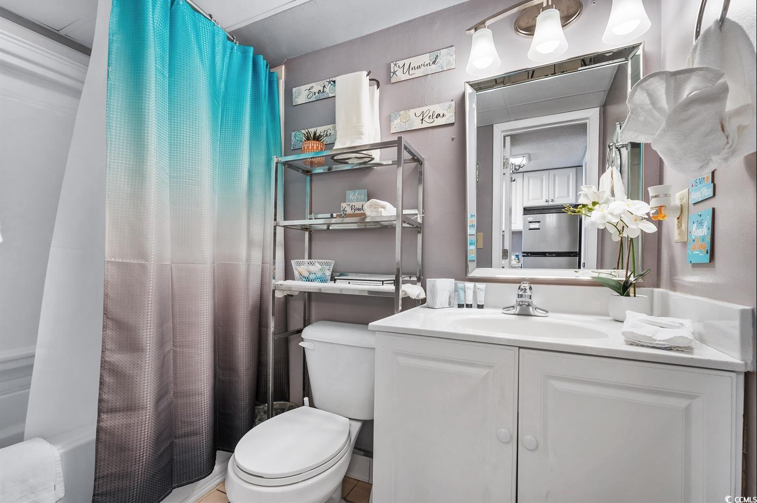 201 74th Avenue North, Unit 2527 Myrtle Beach, SC 29572 - Photo 7 of 18 Bathroom featuring vanity and shower / bath combo