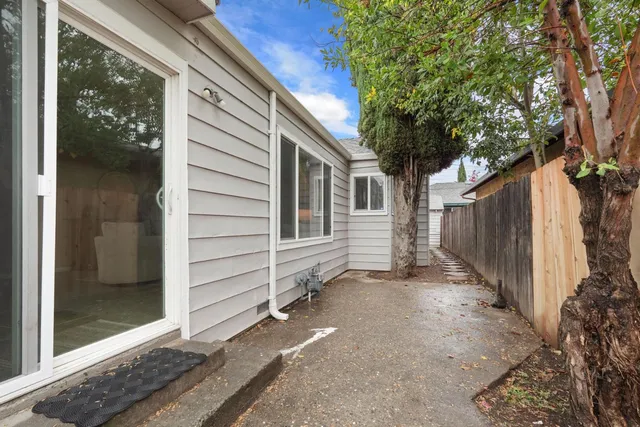 a view of house with backyard