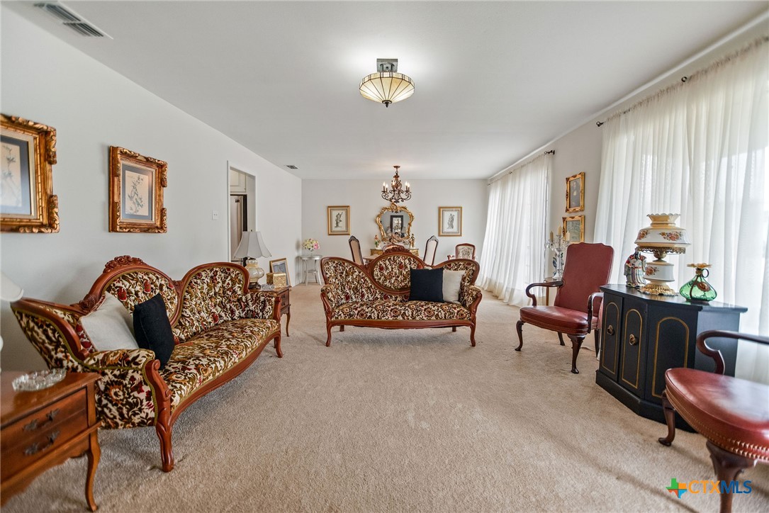 207 Williams Street Tivoli, TX 77990 - Photo 10 of 32 a living room with furniture and a window