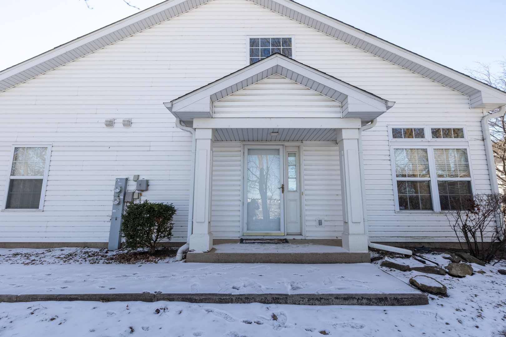 1693 Waterford Road North Aurora, IL 60542 - Photo 2 of 38 a front view of a house with garden