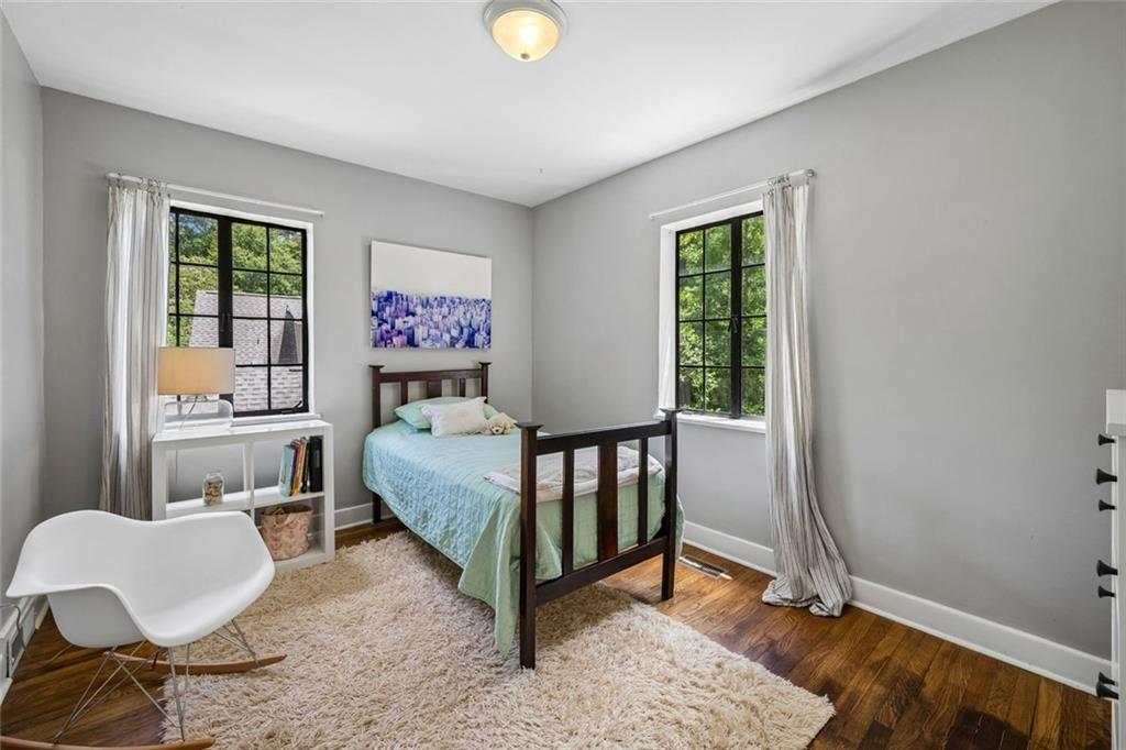 2069 Edinburgh Terrace Northeast Atlanta, GA 30307 - Photo 24 of 72 a bedroom with a bed and a window