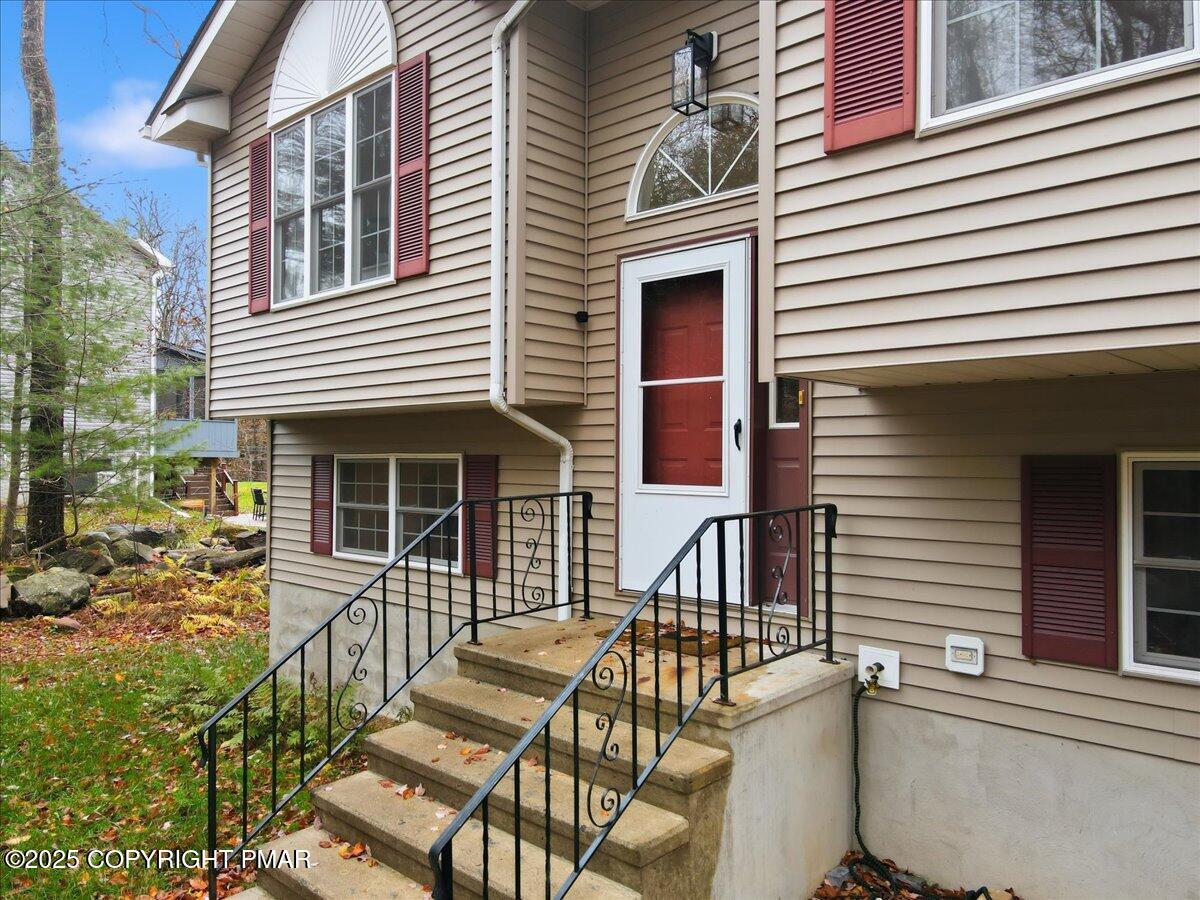 163 Long Woods Road Tobyhanna, PA 18466 - Photo 2 of 52 a view of house with deck and furniture