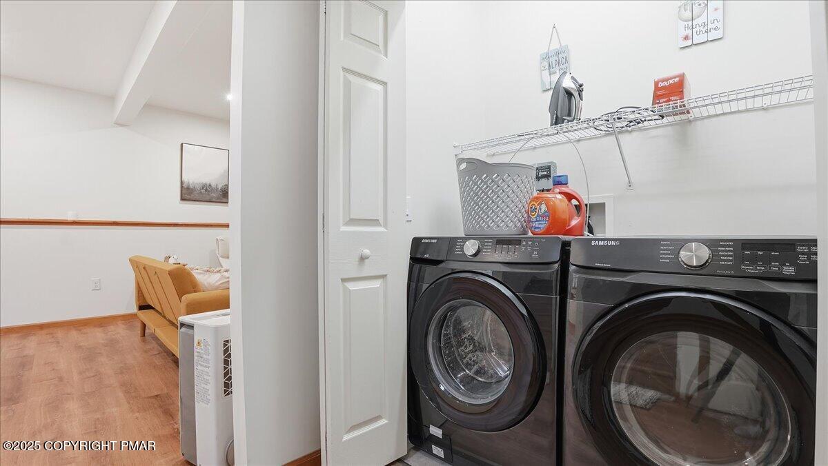 163 Long Woods Road Tobyhanna, PA 18466 - Photo 30 of 52 a utility room with dryer and washer