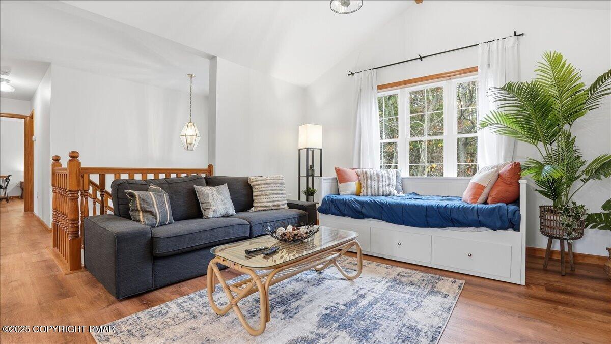 163 Long Woods Road Tobyhanna, PA 18466 - Photo 5 of 52 a living room with furniture and a large window
