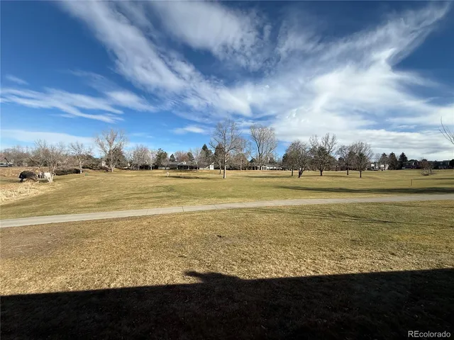 a view of a floor to ceiling window with an ocean view