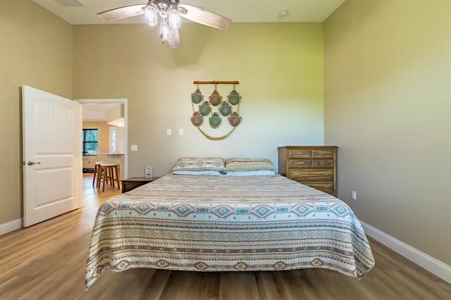 a bedroom with a bed and a table