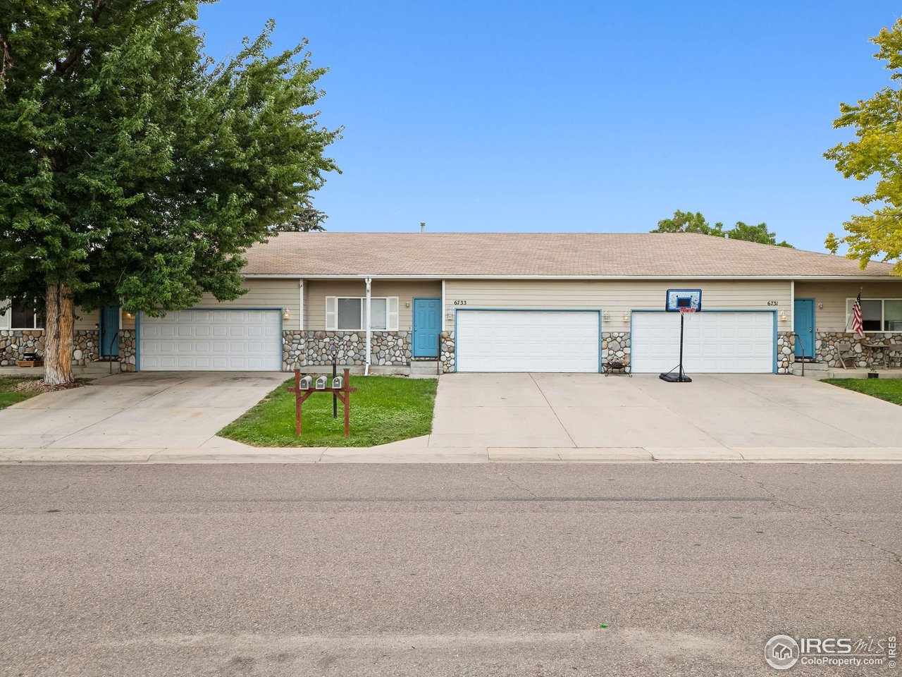6735 West 37th Place Wheat Ridge, CO 80033 - Photo 16 of 17 a house view with a garden space