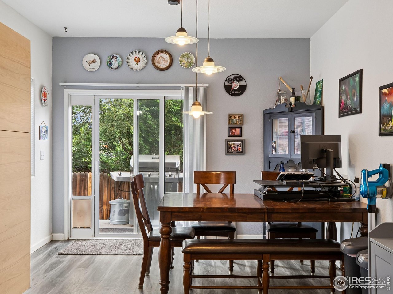 6735 West 37th Place Wheat Ridge, CO 80033 - Photo 5 of 17 a view of a dining room with furniture window and outside view