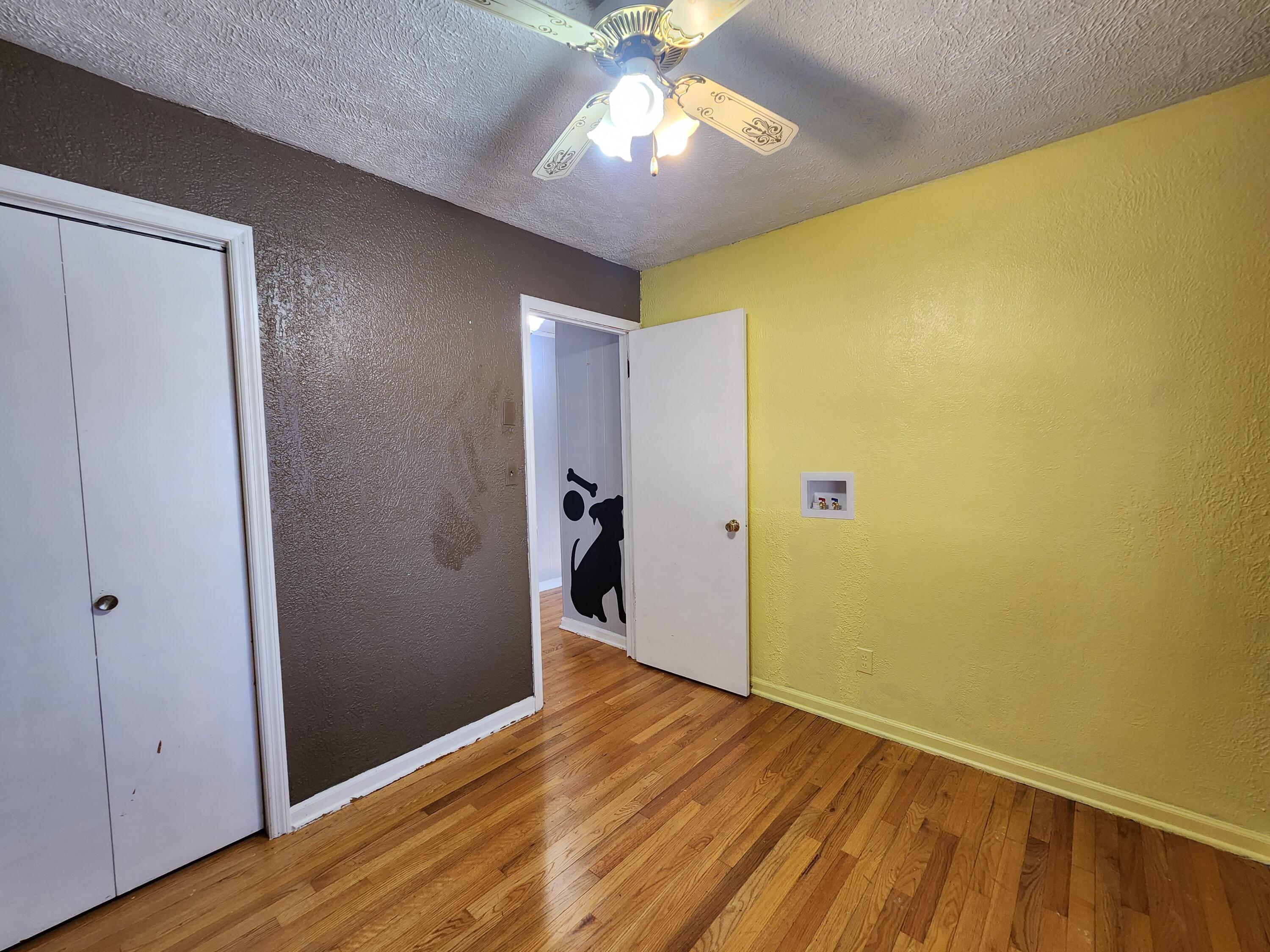 10519 Henry Road Henry, VA 24102 - Photo 14 of 25 a view of empty room with wooden floor