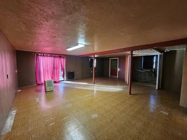 a view of gallery with windows