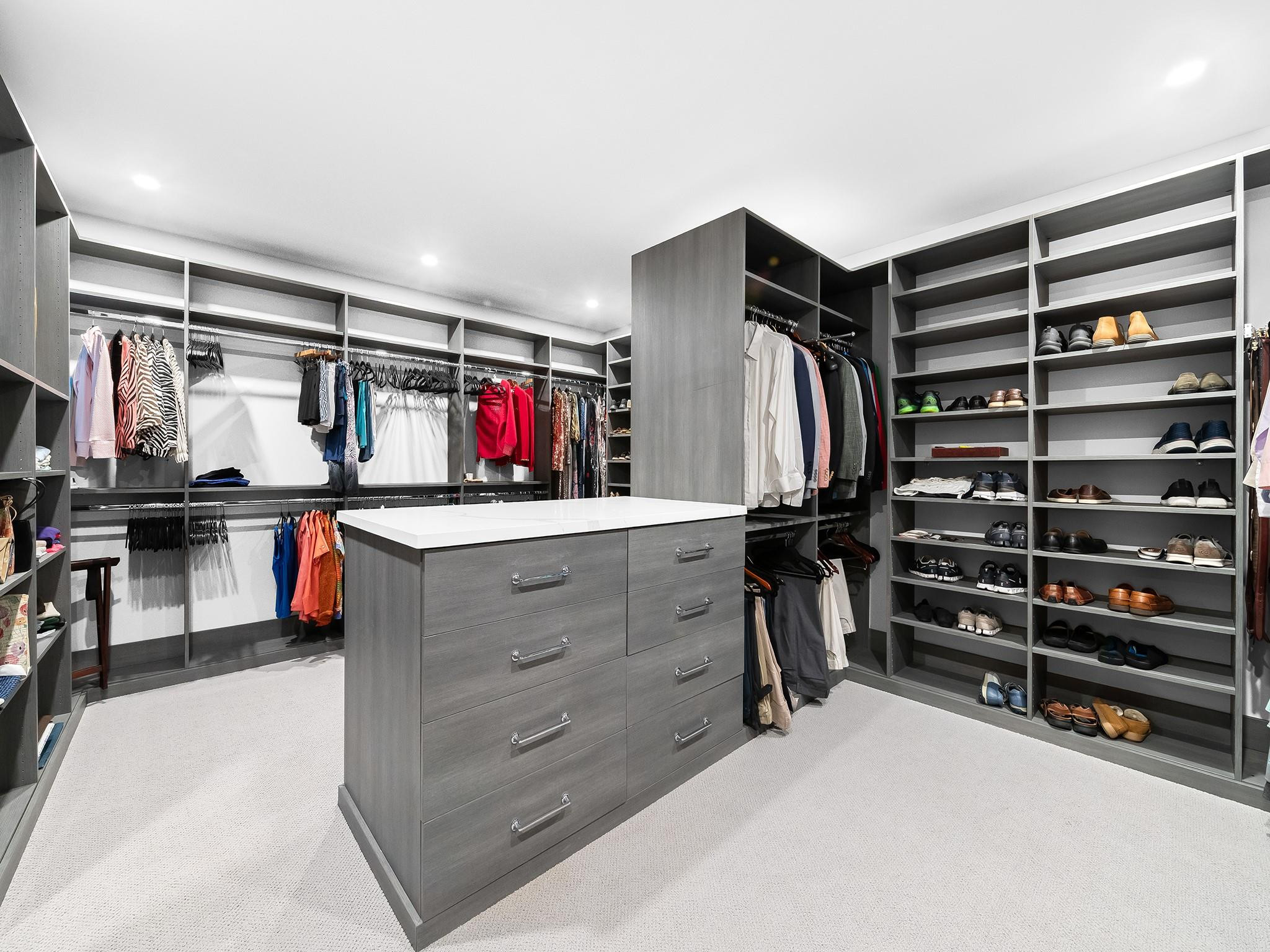 525 North Victoria Park Road Fort Lauderdale, FL 33301 - Photo 21 of 52 a view of walk in closet with clothes and shoes