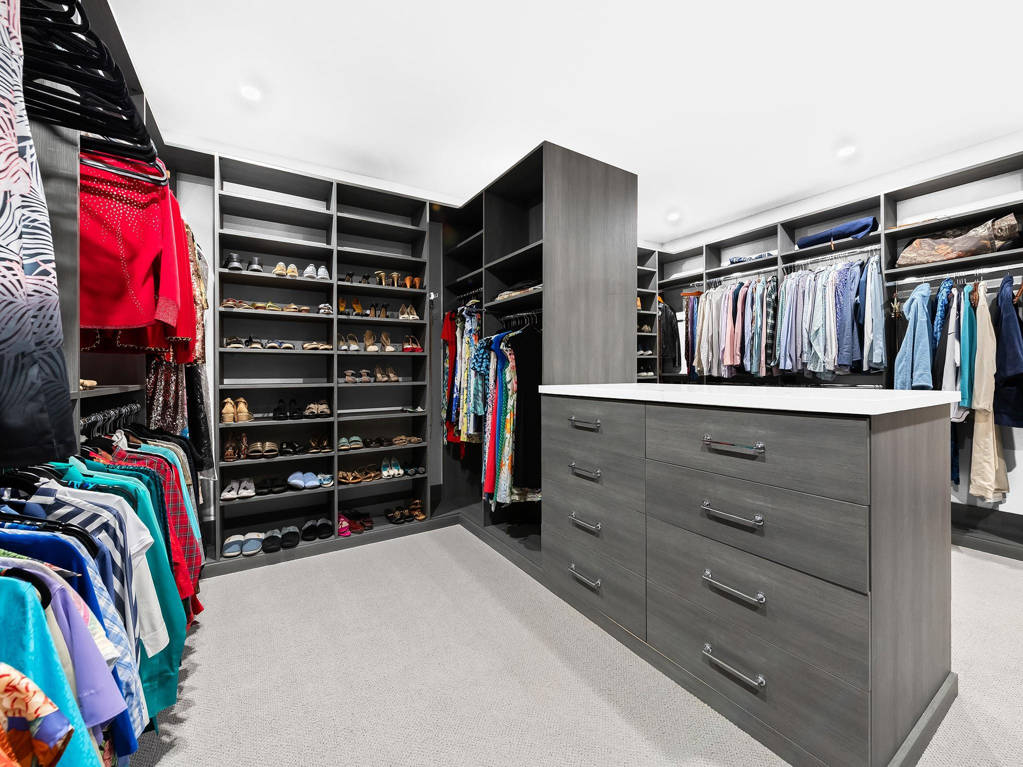 525 North Victoria Park Road Fort Lauderdale, FL 33301 - Photo 22 of 52 a view of walk in closet with clothes and shoes
