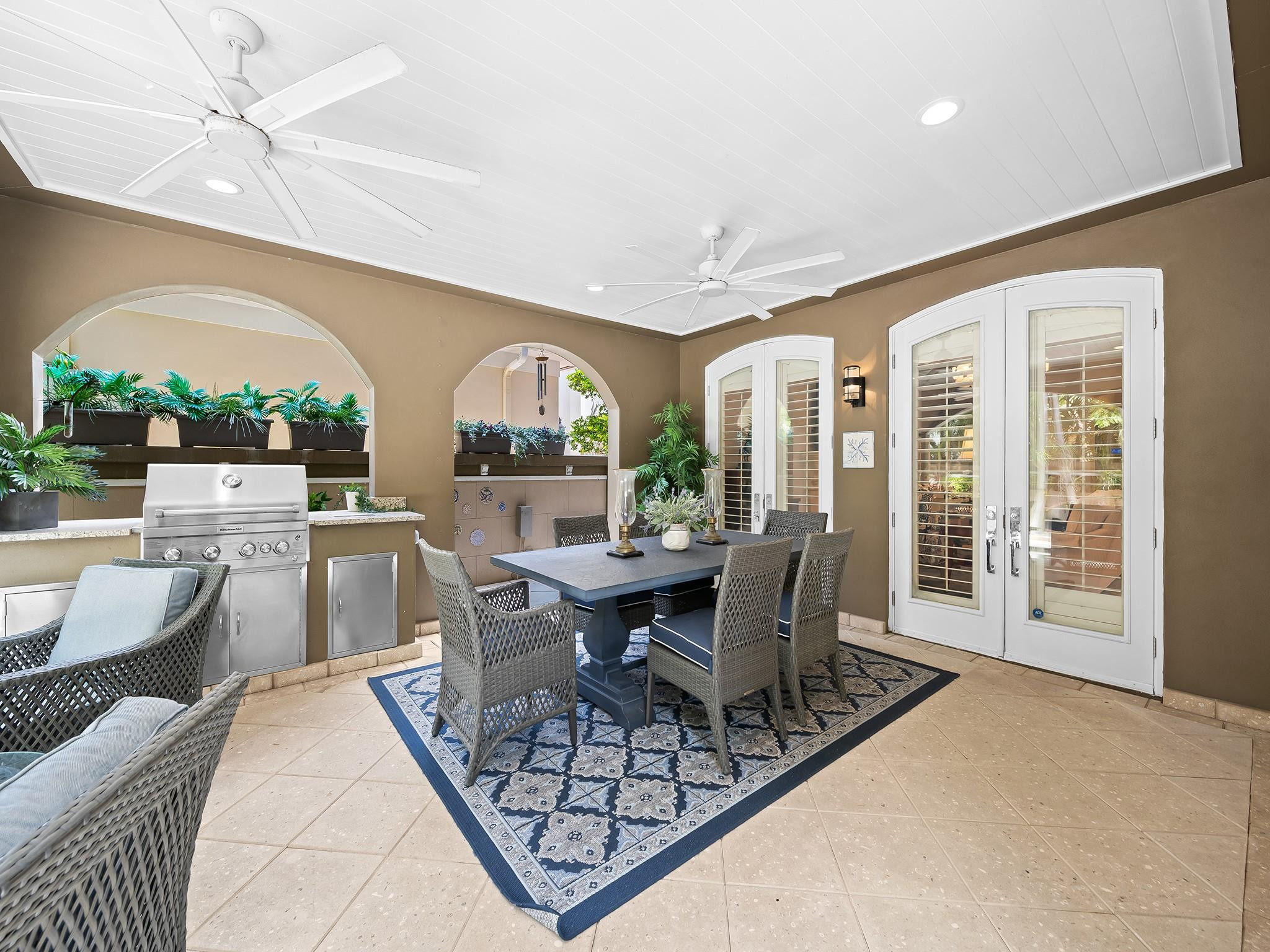 525 North Victoria Park Road Fort Lauderdale, FL 33301 - Photo 36 of 52 a living room with patio furniture and a large window