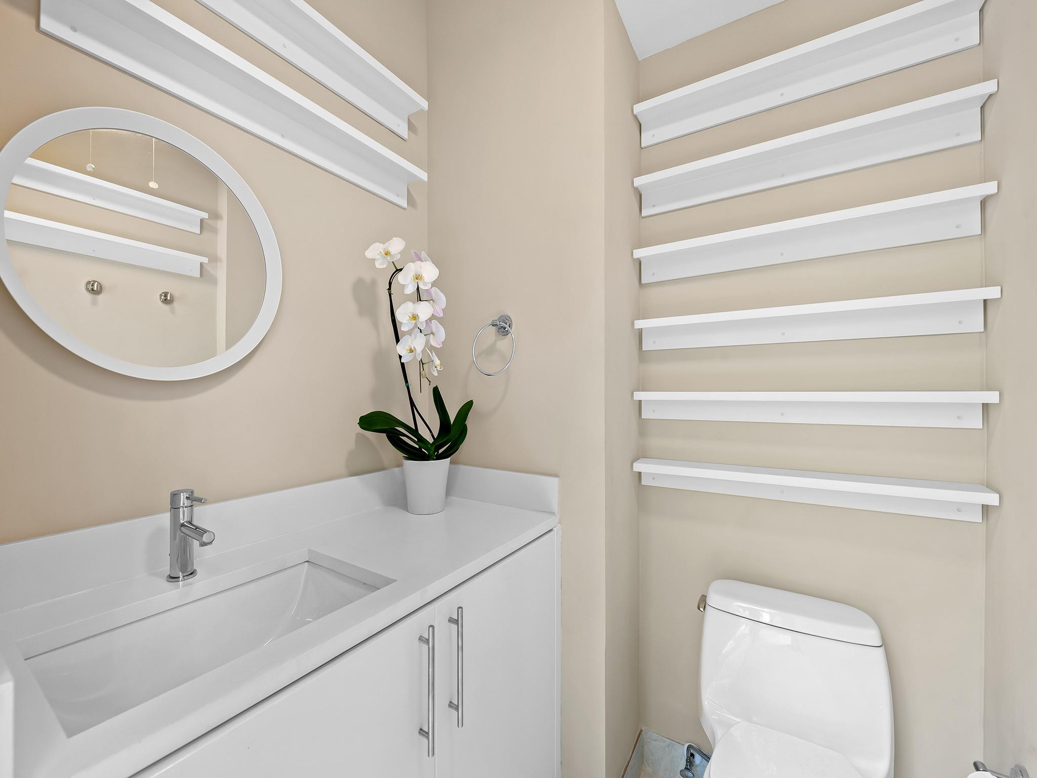 525 North Victoria Park Road Fort Lauderdale, FL 33301 - Photo 46 of 52 a bathroom with a toilet and a sink