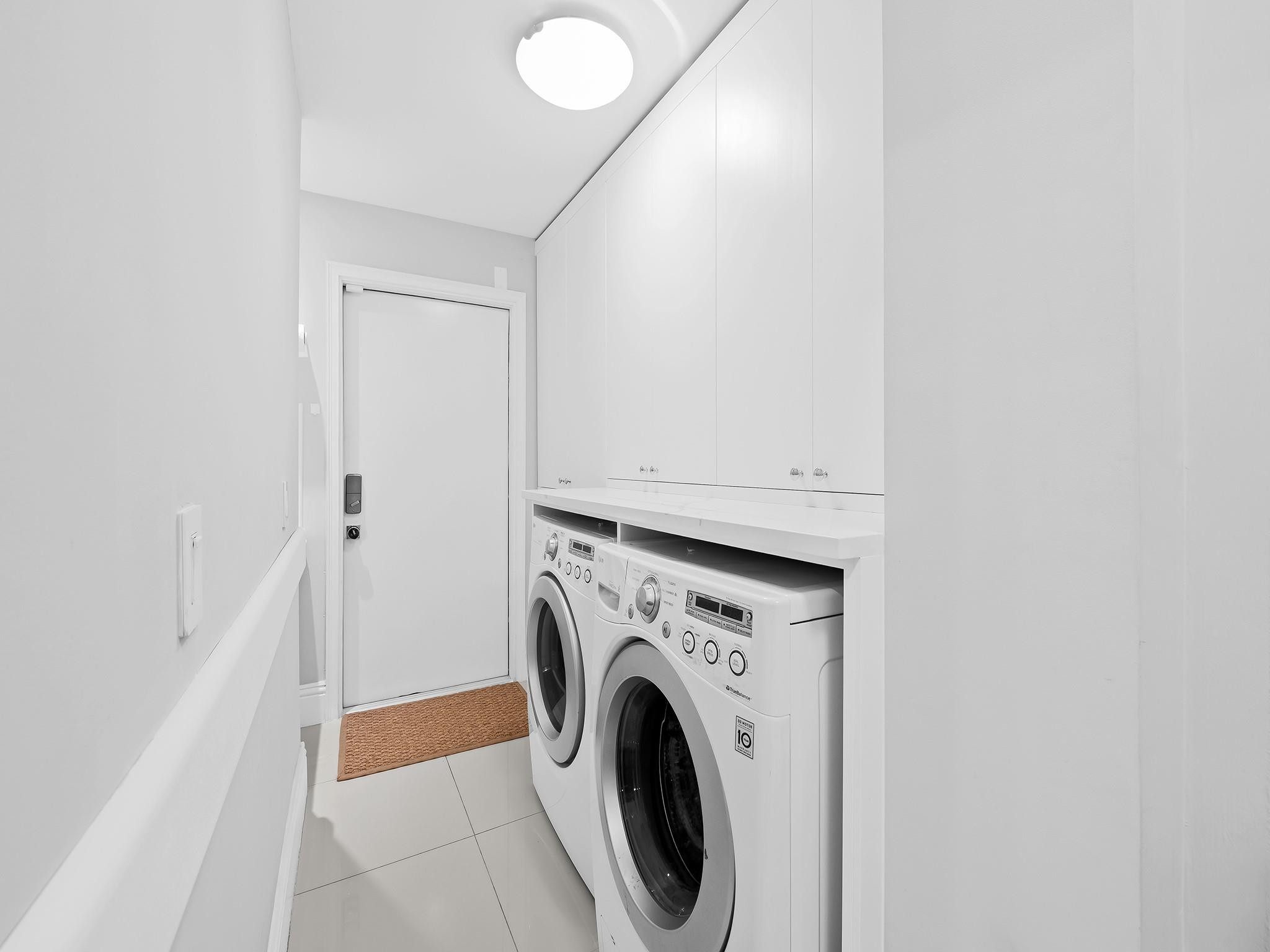 525 North Victoria Park Road Fort Lauderdale, FL 33301 - Photo 47 of 52 a utility room with dryer and washer