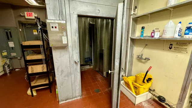 a bathroom with a tub and shower