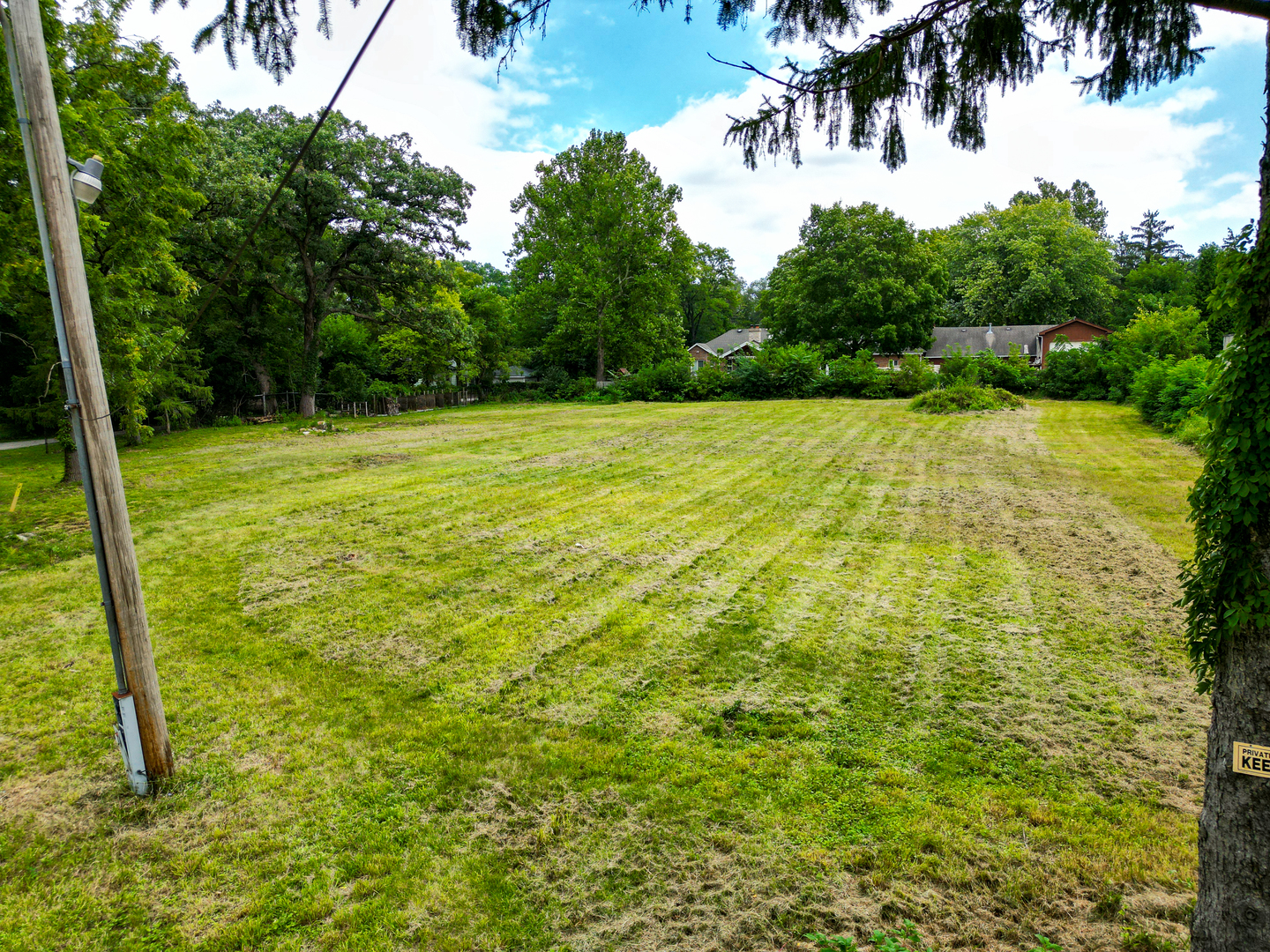 8950 Wolf Road Burr Ridge, IL 60527 - Photo 4 of 8 a view of a yard with an outdoor space