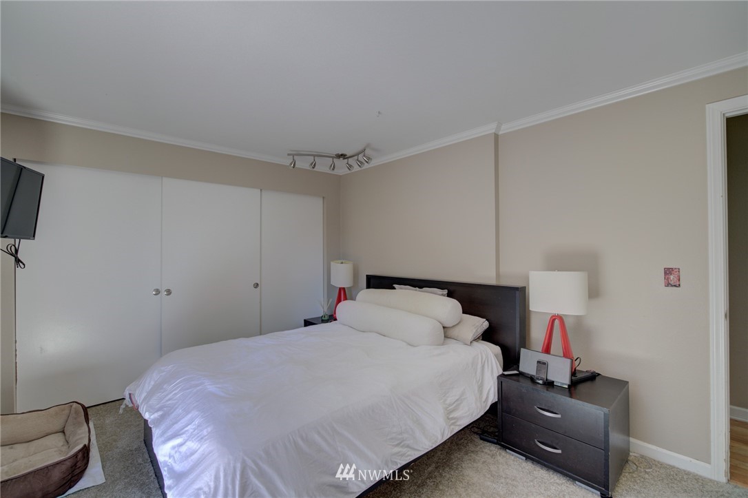 1 172nd Place Southwest Bothell, WA 98012 - Photo 17 of 27 a bedroom with a bed and a tv