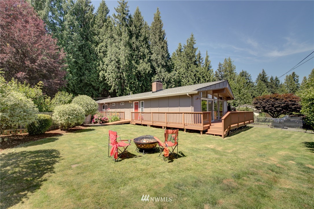 1 172nd Place Southwest Bothell, WA 98012 - Photo 22 of 27 a view of a house with yard and sitting area