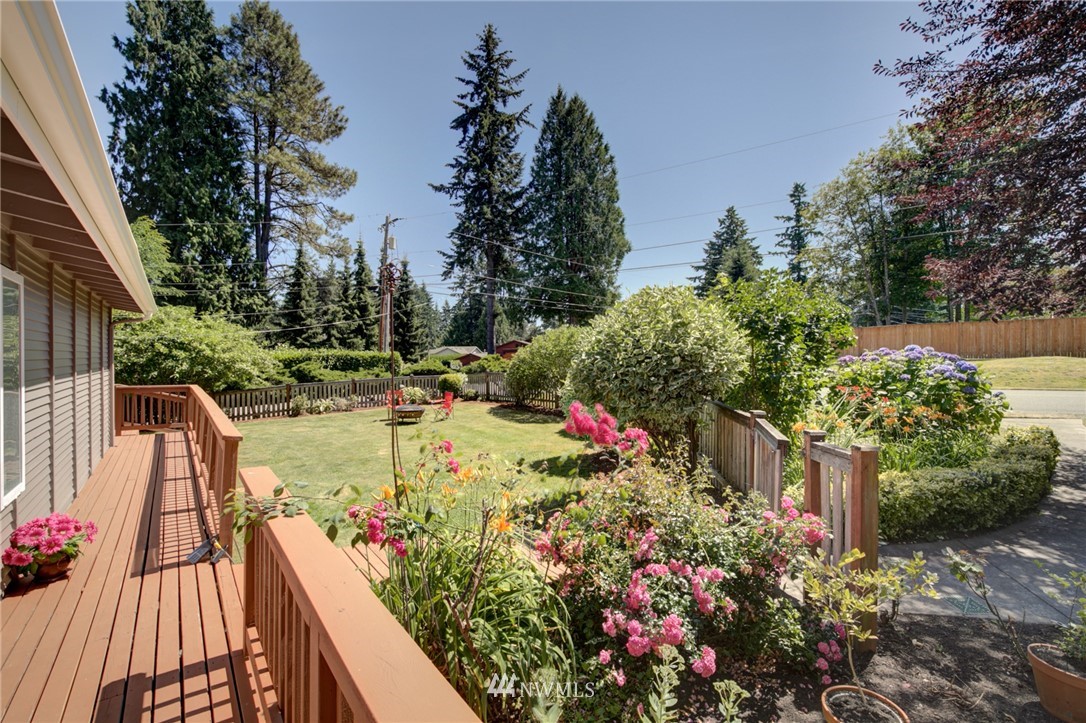 1 172nd Place Southwest Bothell, WA 98012 - Photo 26 of 27 a view of a garden with flowers and trees