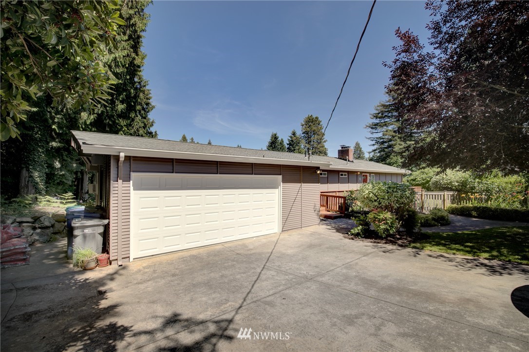 1 172nd Place Southwest Bothell, WA 98012 - Photo 27 of 27 a view of a house with a yard and garage