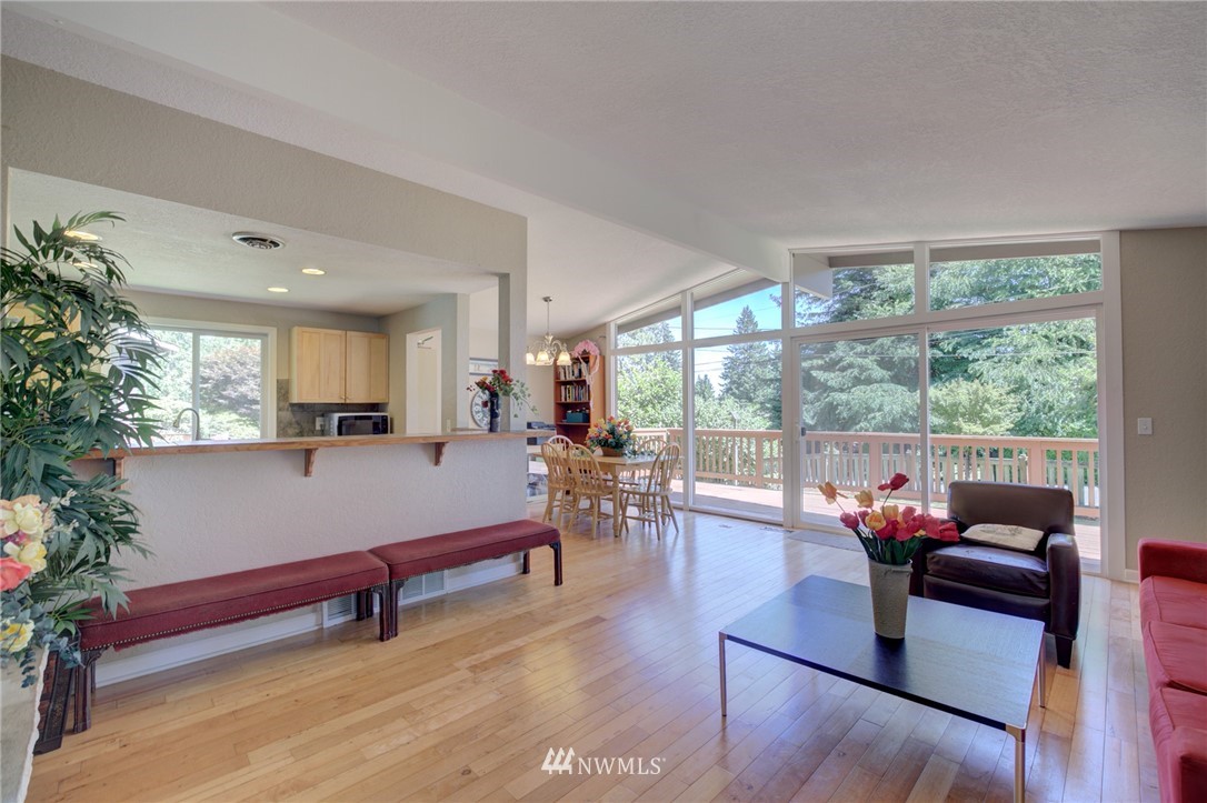 1 172nd Place Southwest Bothell, WA 98012 - Photo 6 of 27 a living room with furniture and a large window