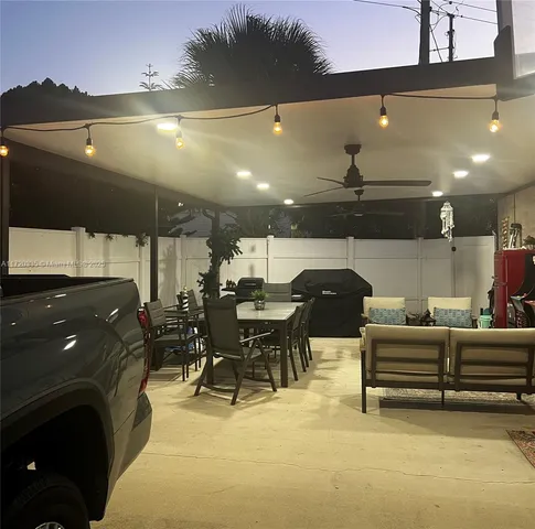 a view of swimming pool from a yard