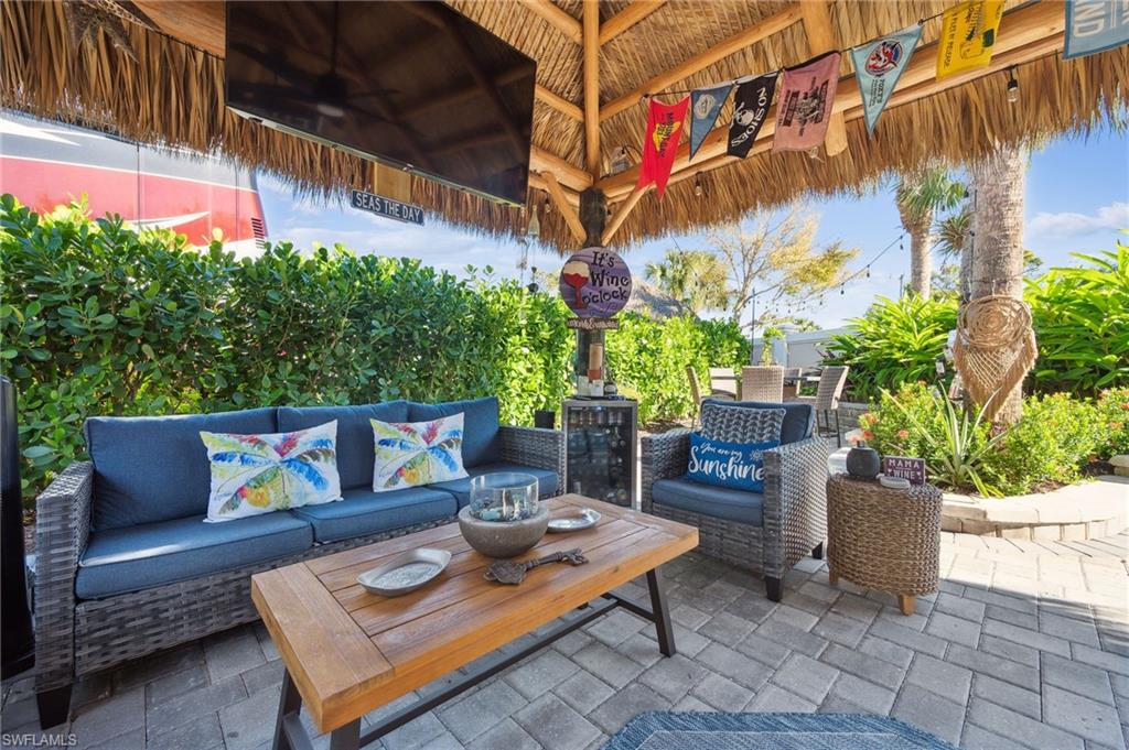 a view of a chairs and table in a patio
