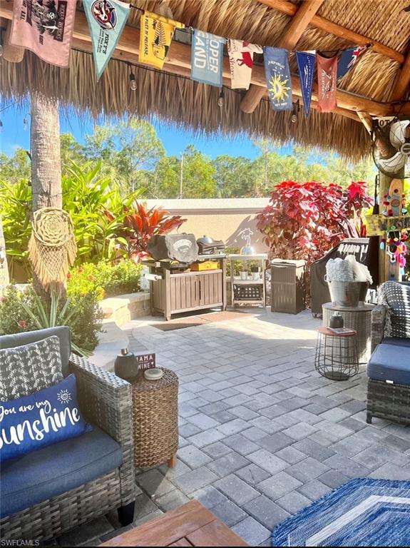 13575 Snook Circle Naples, FL 34114 - Photo 26 of 50 a view of outdoor space and porch