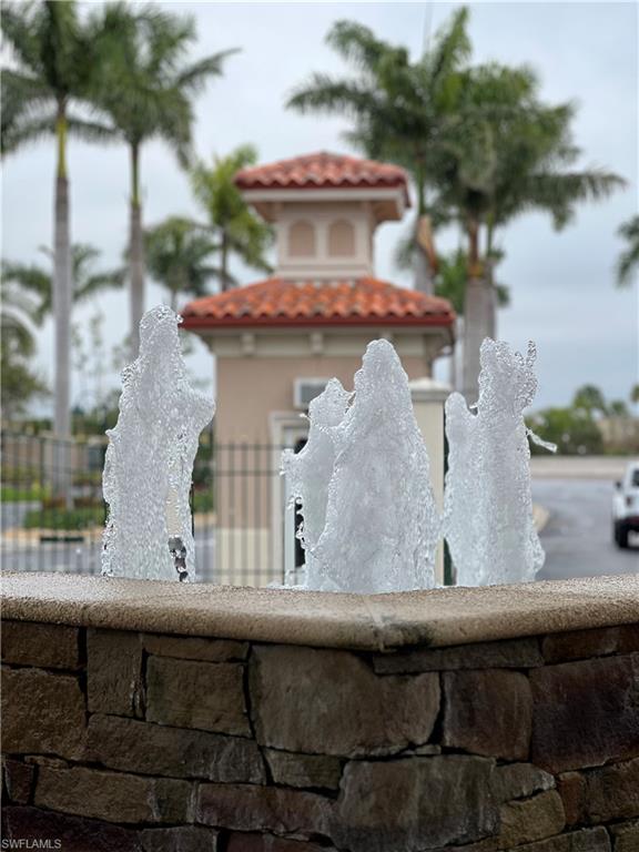 13575 Snook Circle Naples, FL 34114 - Photo 32 of 50 a view of a wooden house with a yard