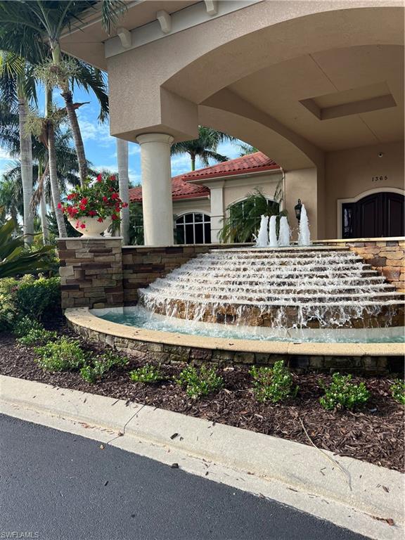 13575 Snook Circle Naples, FL 34114 - Photo 33 of 50 a view of a house with a porch