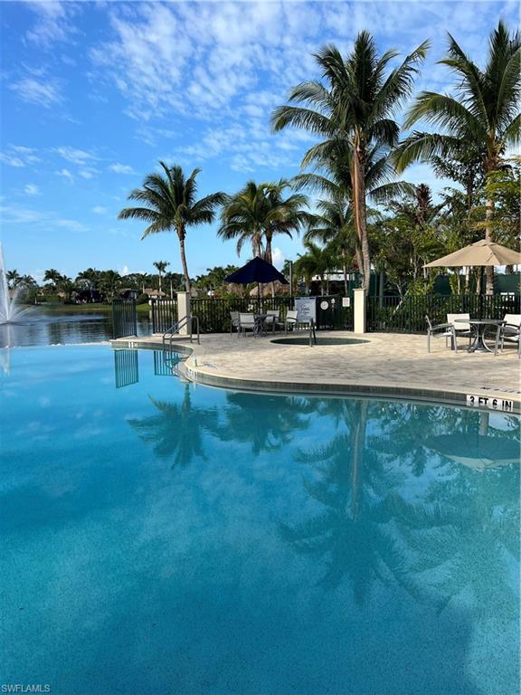 13575 Snook Circle Naples, FL 34114 - Photo 34 of 50 a view of a yard and palm trees
