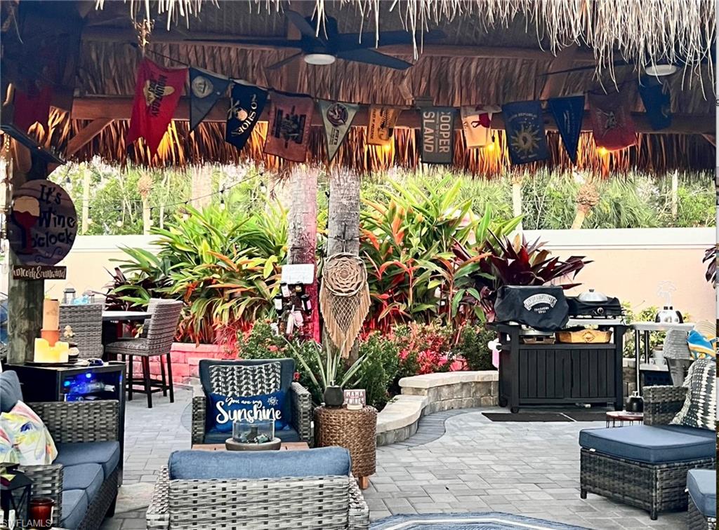 13575 Snook Circle Naples, FL 34114 - Photo 8 of 50 a view of street with sitting area