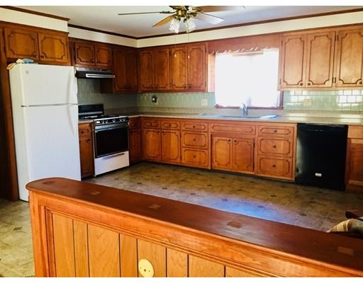 356 Neck Road Rochester, MA 02770 - Photo 3 of 11 a kitchen with granite countertop a refrigerator and a sink