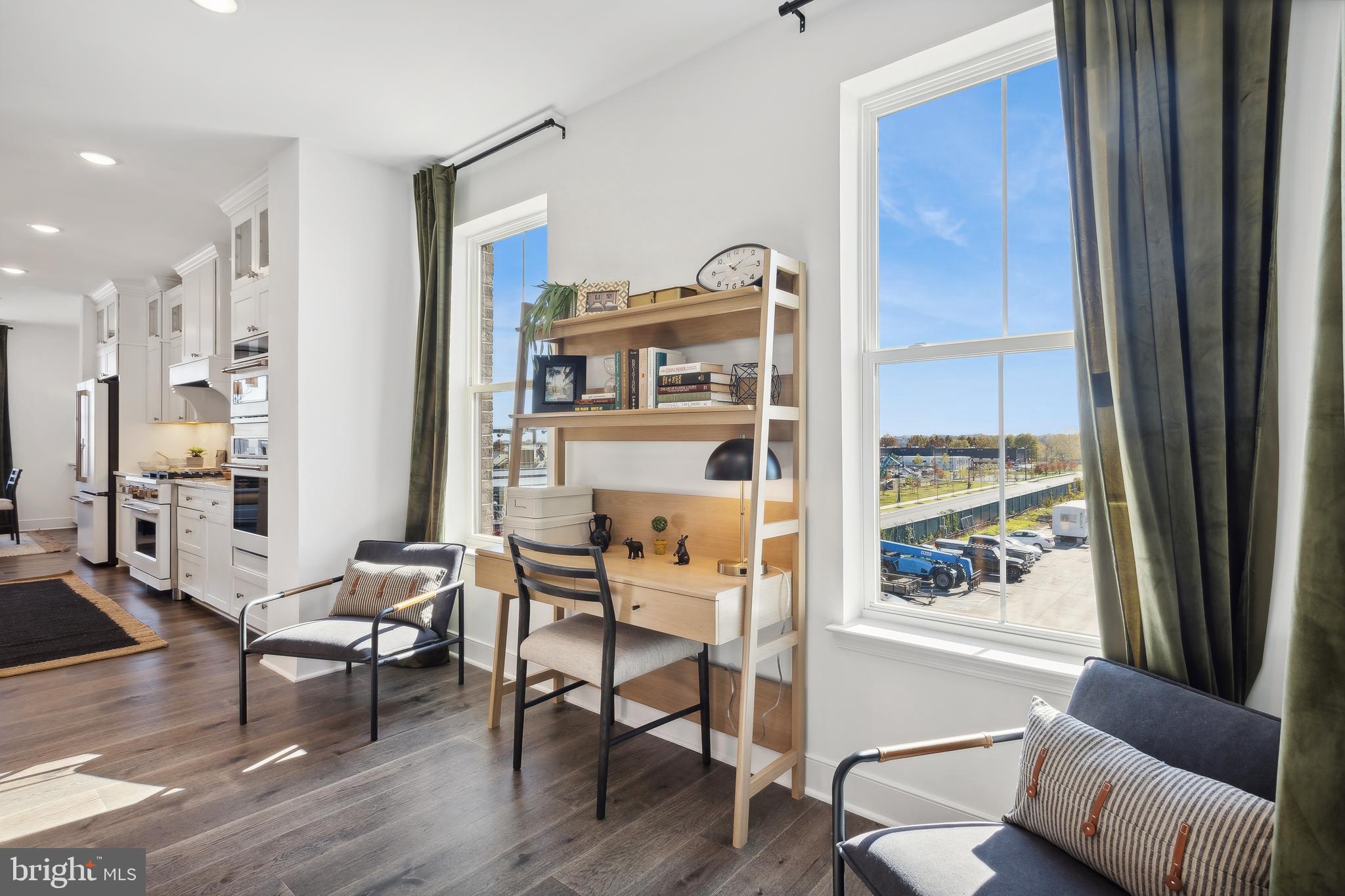 128 Locke Street, Unit 2029 Baltimore, MD 21230 - Photo 11 of 29 a living room with furniture and a window