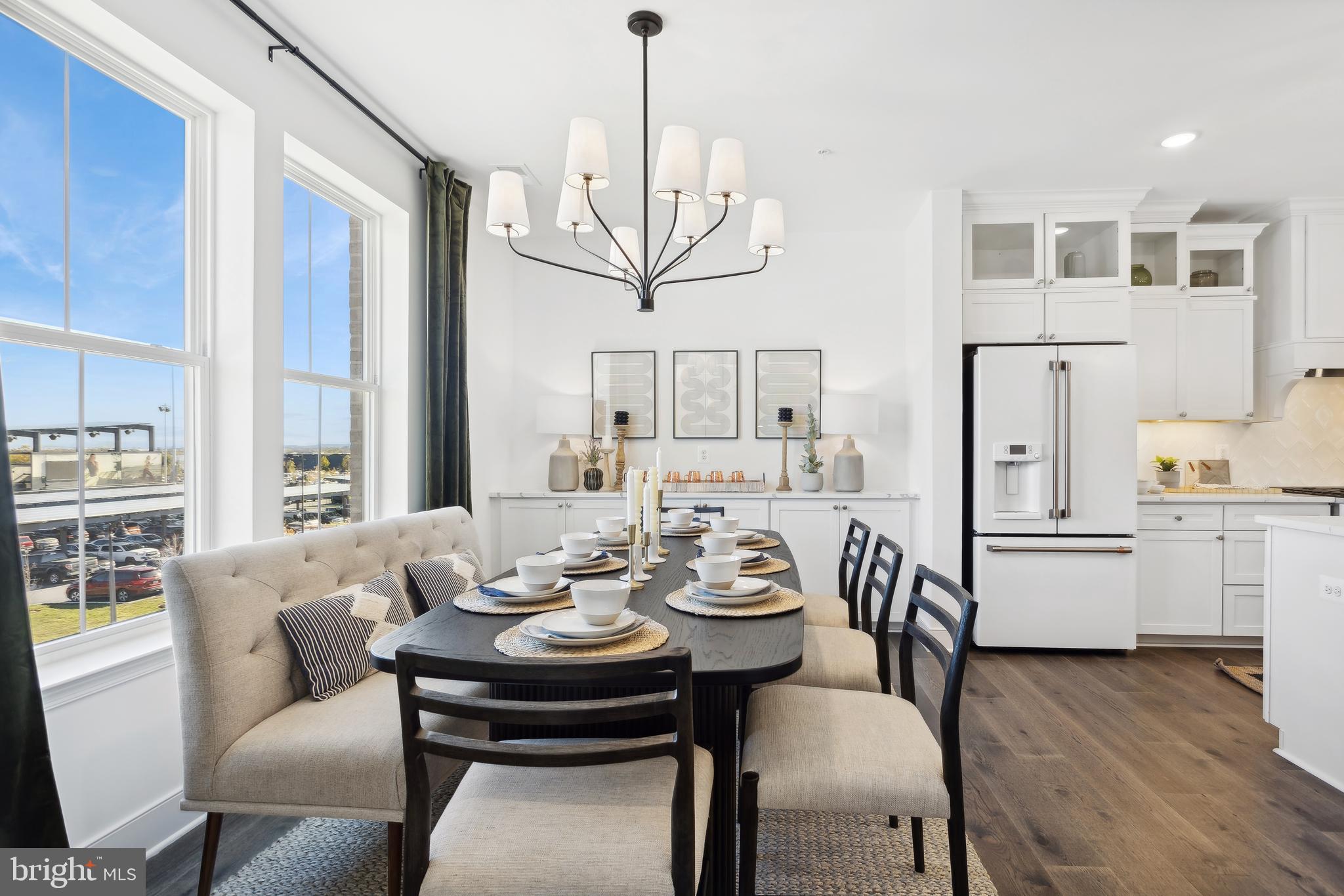 128 Locke Street, Unit 2029 Baltimore, MD 21230 - Photo 25 of 29 a view of a dining room with furniture window and wooden floor
