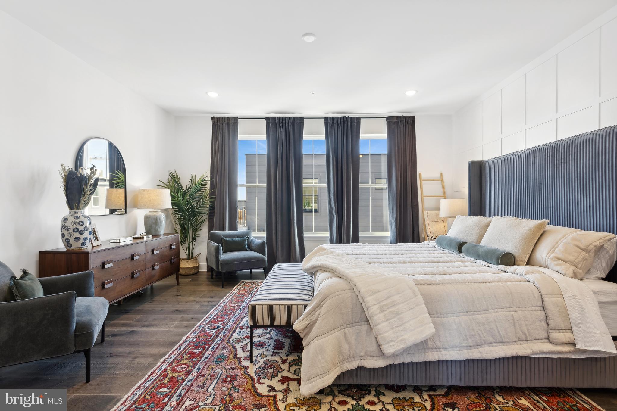 128 Locke Street, Unit 2029 Baltimore, MD 21230 - Photo 26 of 29 a bed room with a bed and a couch