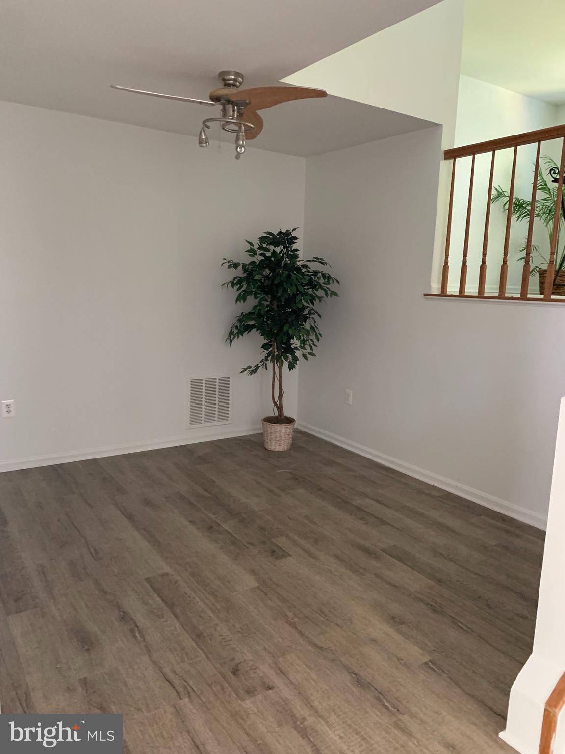 5478 Stavendish Street Burke, VA 22015 - Photo 9 of 24 a view of entryway with a potted plant
