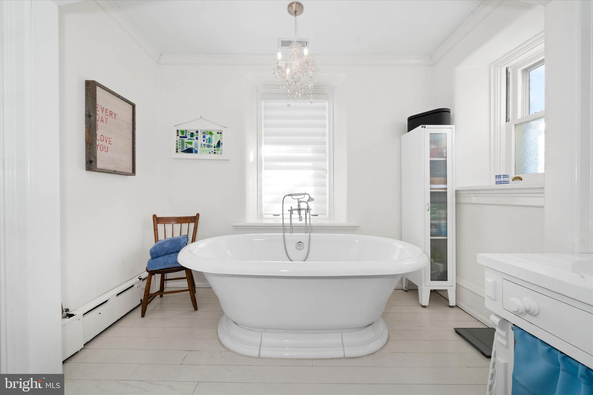 2412 Delaware Avenue Wilmington, DE 19806 - Photo 31 of 64 a white bath tub sitting in a bathroom
