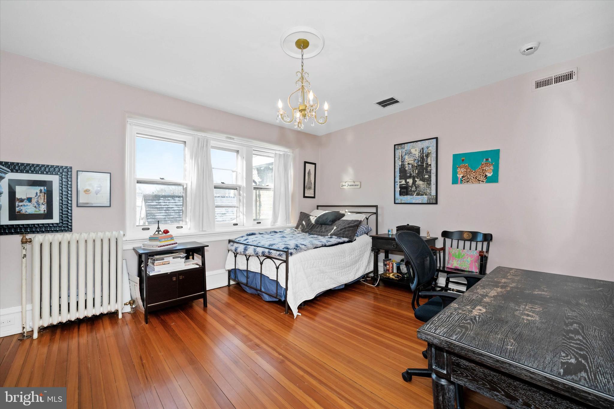 2412 Delaware Avenue Wilmington, DE 19806 - Photo 34 of 64 a living room with furniture and a wooden floor