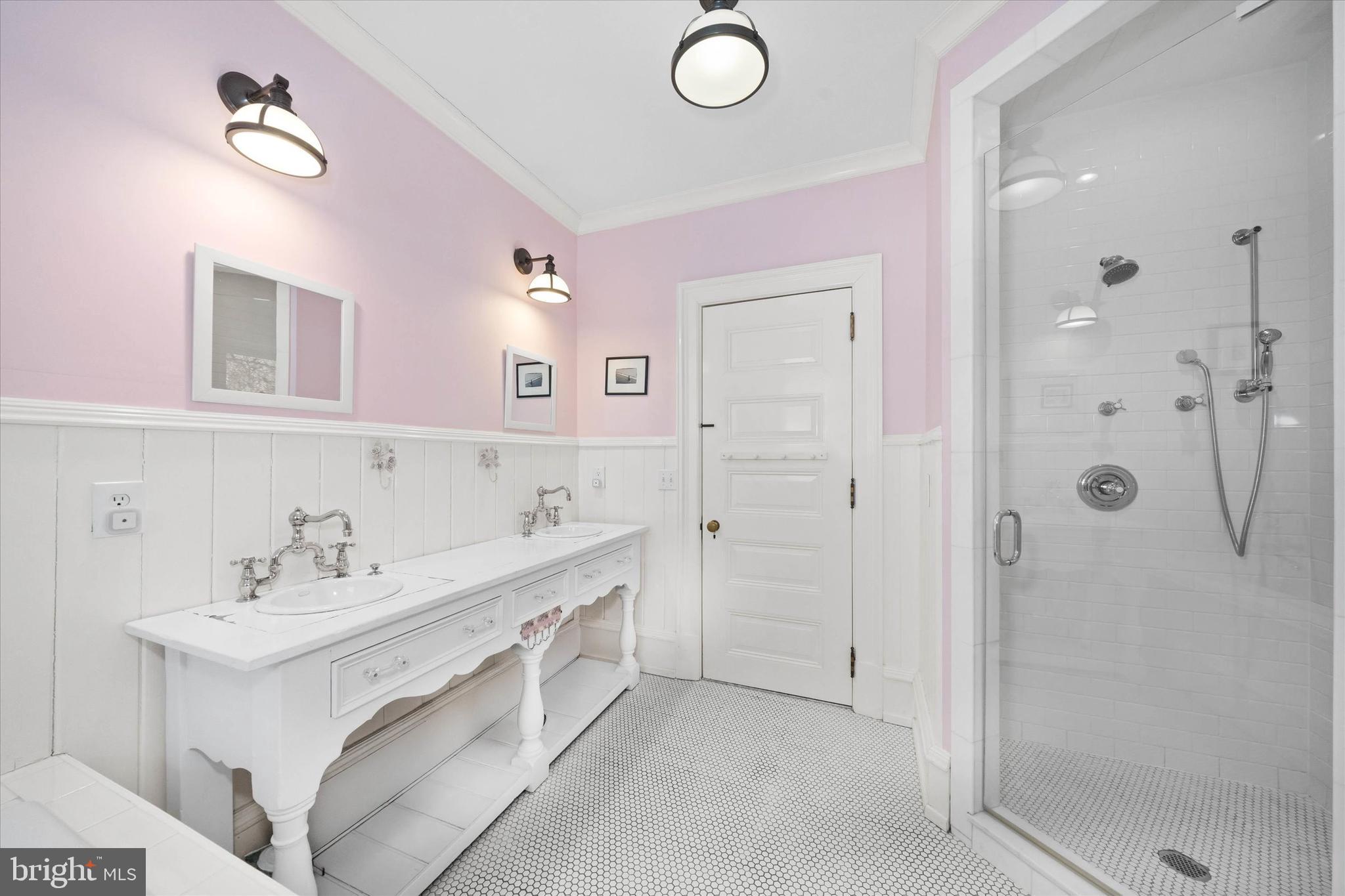 2412 Delaware Avenue Wilmington, DE 19806 - Photo 37 of 64 a bathroom with a sink vanity and shower